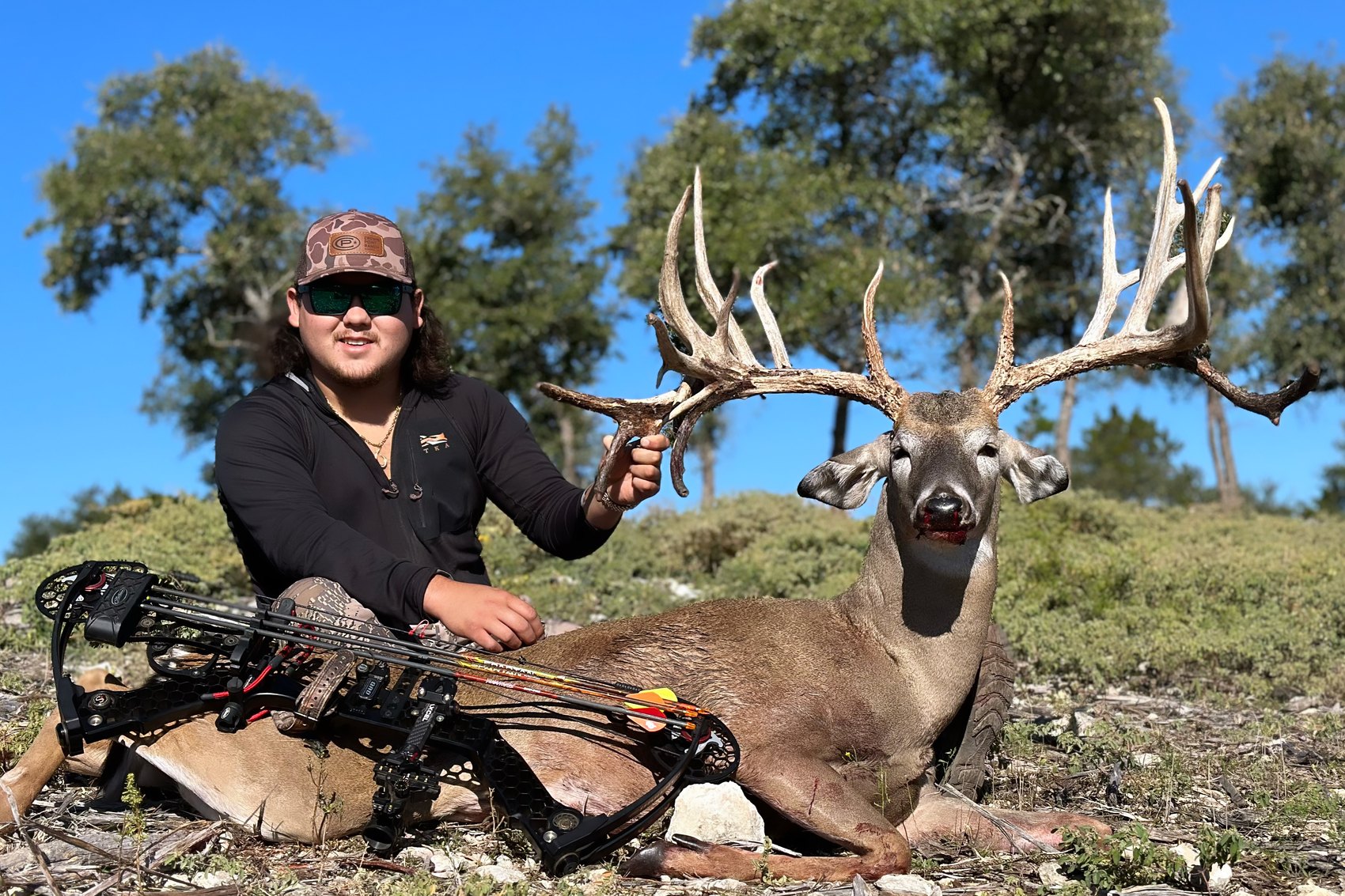 Tall-tined whitetail buck taken with a bow at Crown Point Ranch in Texas
